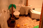 It took 20kg of soft builders' sand, an old-fashioned wooden chest and some inflatable palm-trees, to create an indoor beach in my bathroom!